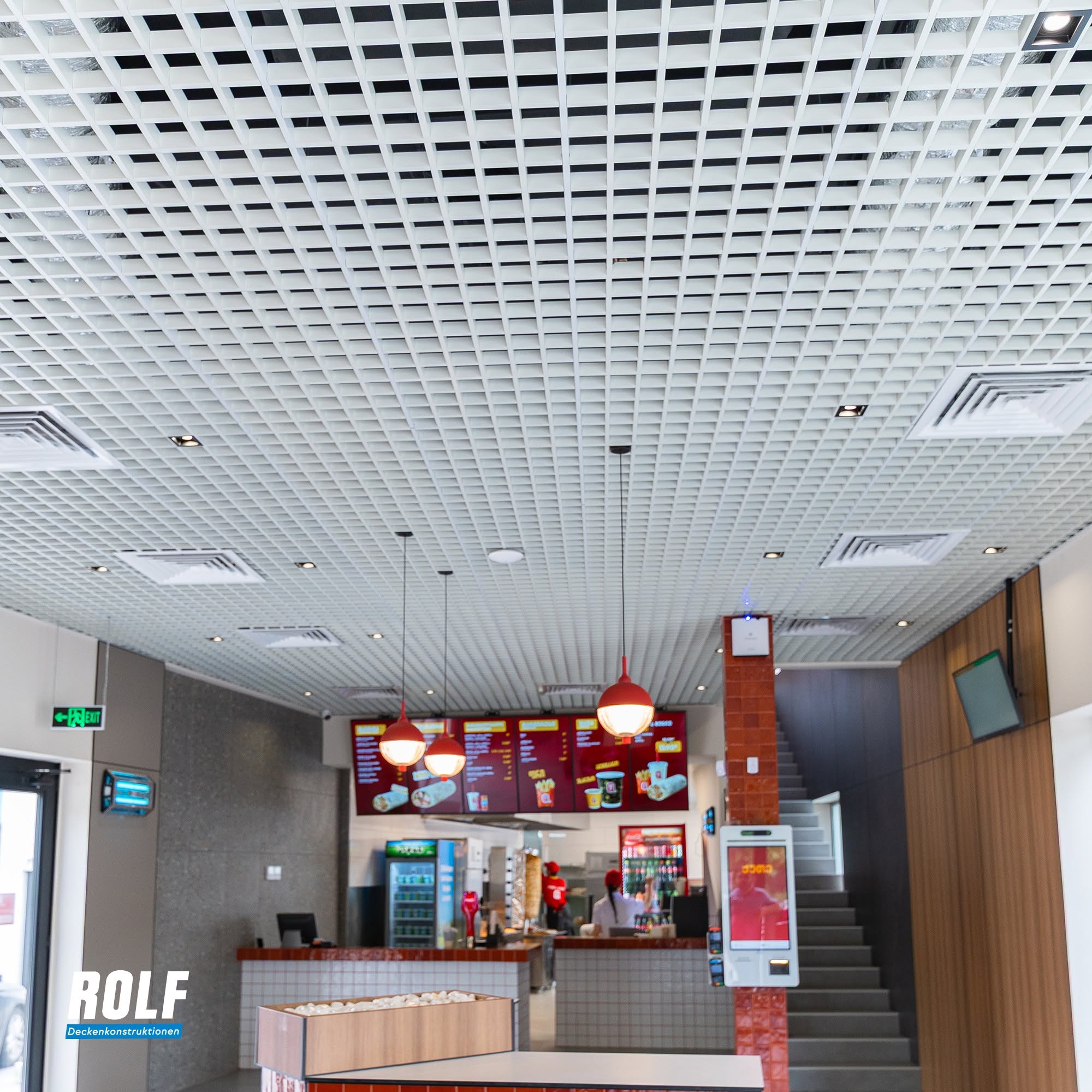 Modern ceiling with grid pattern.
