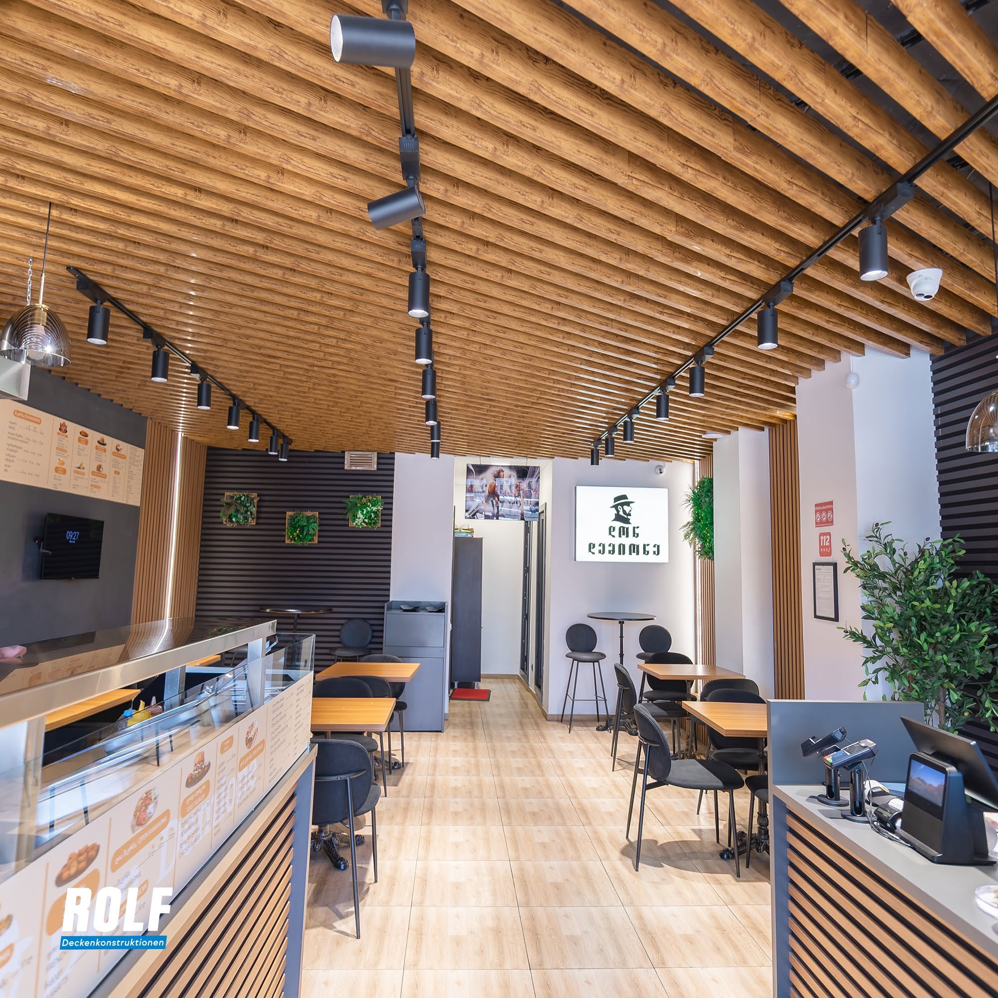 Modern cafe with wooden ceiling design